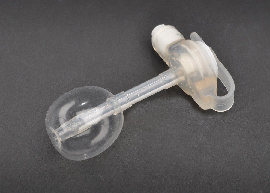 Feeding tube with balloon (filled with water)