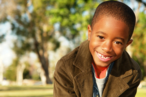 Photo of smiling boy wearing a jacket