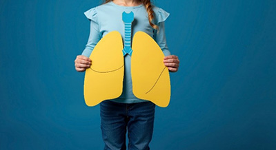 girl holding diagram