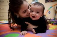 mother with child on floor