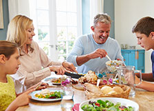 Family eating together around a table