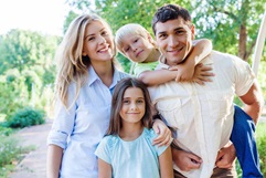 Family with their two kids outside on a walk