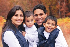 Picture of mom and dad with two kids