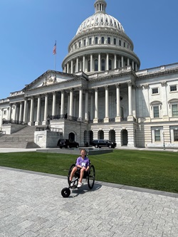 Children's patient, Ellie, in front of the U.S. Capitol