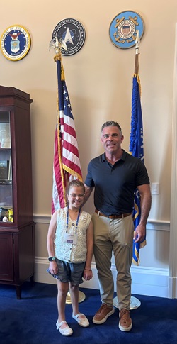 Children's patient, Ellie, with Representative Tony Wied