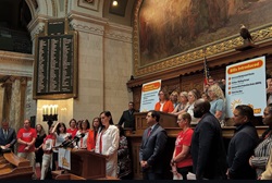 Dr. Kellie Snooks speaking at a press conference