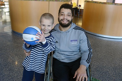 Man and boy with basketball