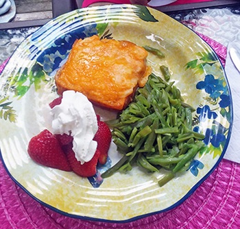 A typical meal for Abigail: A tuna melt, green beans, strawberries and whipped cream with a cherry seltzer water. 6.5 net carbs.