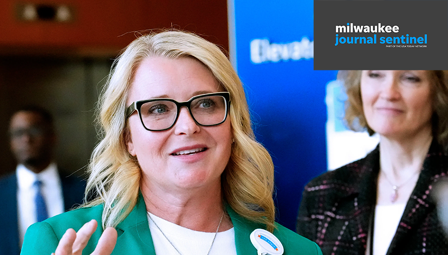Amy Herbst, VP of Mental and Behavioral Health at Children's Wisconsin, talks with Wisconsin Governor Tony Evers.