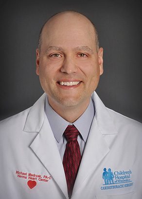 Michael Madrzak, PAC