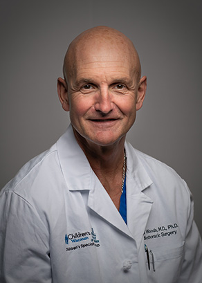 Ronald K Woods, MD