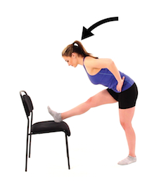 woman stretching on chair