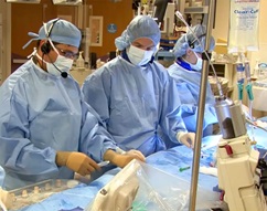 Doctors in surgery completing a diagnostic cardiac catheterization at the Herma Heart Institute at Children's Wisconsin
